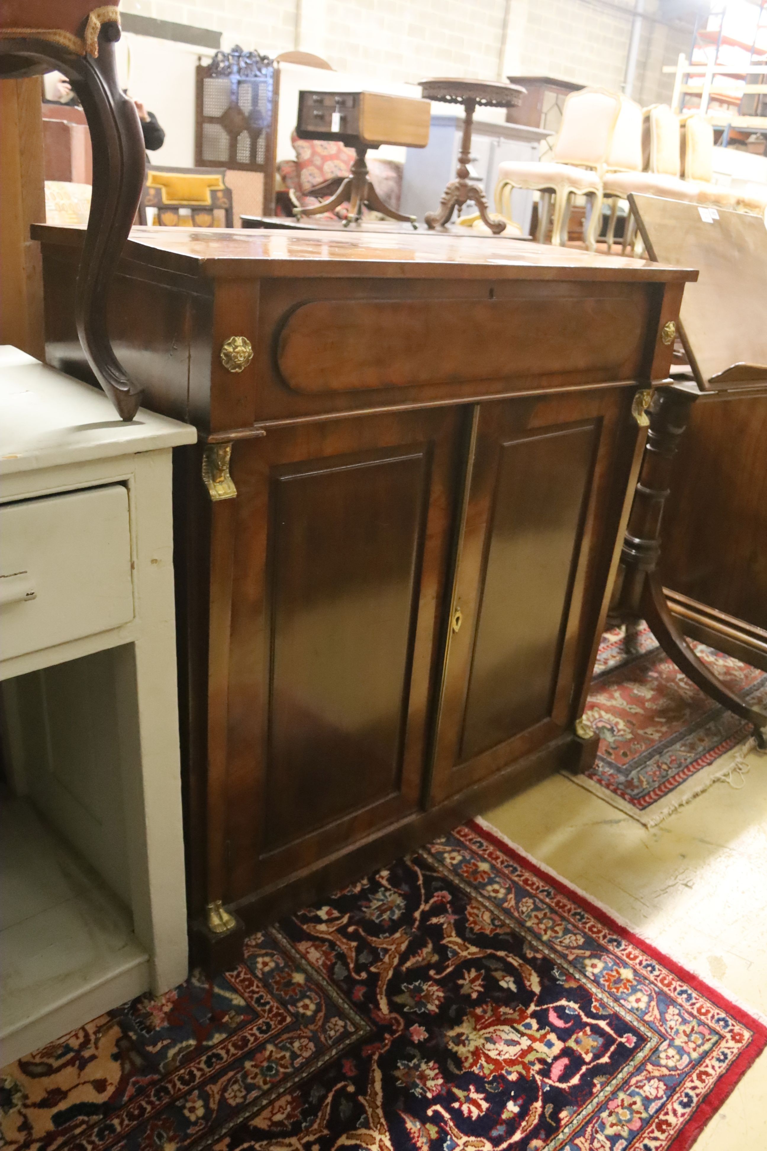 A late Regency mahogany brass mounted chiffonier, width 99cm, depth 46cm, height 102cm